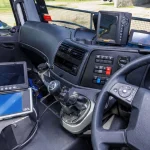 This is an image of the inside of one of the CBS truck's cabs. It shows the Tabula device and the screen for the Whitehead rate controller