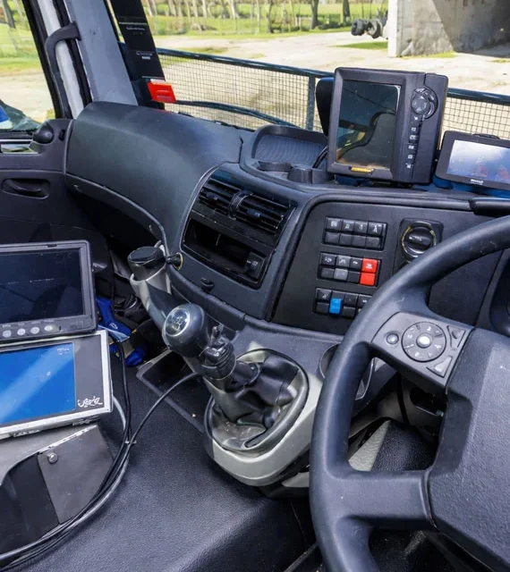 This is an image of the inside of one of the CBS truck's cabs. It shows the Tabula device and the screen for the Whitehead rate controller